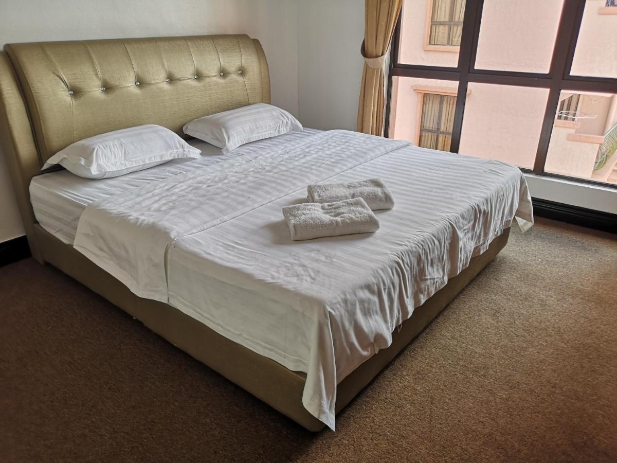 Marina Court Kk City Homestay Кота-Кинабалу Экстерьер фото