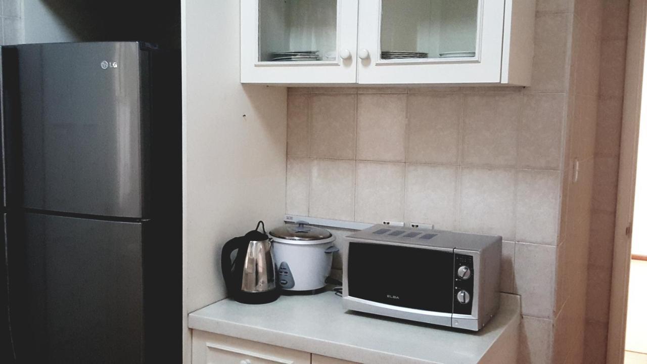 Marina Court Kk City Homestay Кота-Кинабалу Экстерьер фото