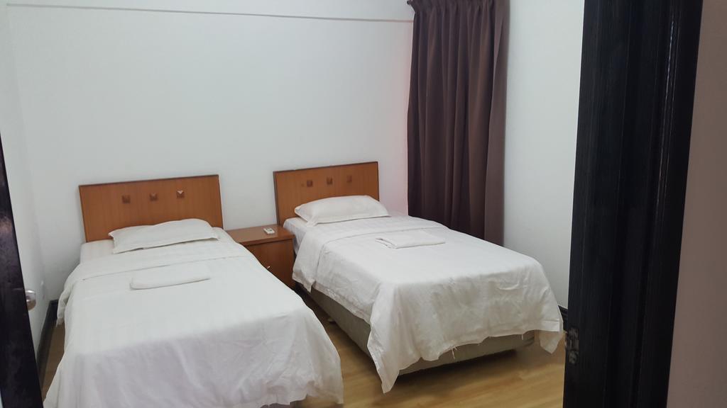 Marina Court Kk City Homestay Кота-Кинабалу Экстерьер фото